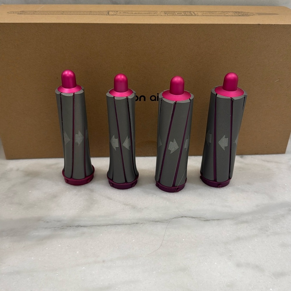 Dyson Airwrap Attachments in Gray and Pink
